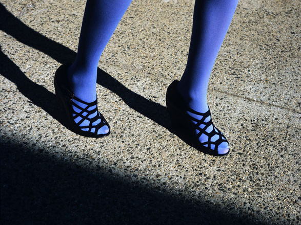 Cropped photo of legs walking